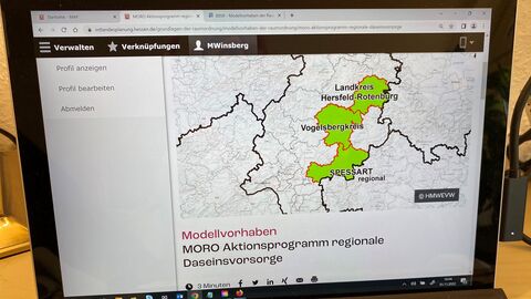 Das Bild zeigt einen Bildschirm mit grün eingefärbten Kreisen in Hessen.